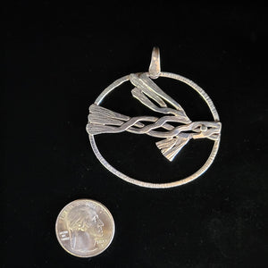 Sterling silver flying dragon pendant (oval) by artist Tim Terry