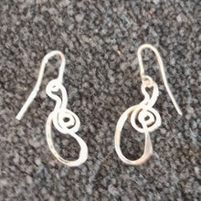Sterling silver earrings by  Lee Cohn