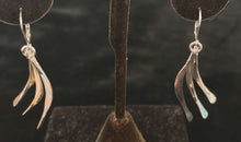 Sterling silver earrings by Lee Cohn