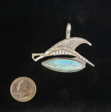 Sterling silver dragon pendant by Tim Terry with coin for size reference