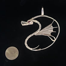 Sterling silver dragon pendant by Tim Terry with coin for size reference
