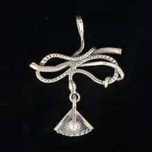 Sterling silver snake pendant by Tim Terry