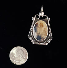 Sterling silver pendant by Tim Terry with coin for size reference