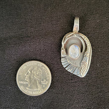 Sterling silver dragon pendant with moonstone by artist Tim Terry
