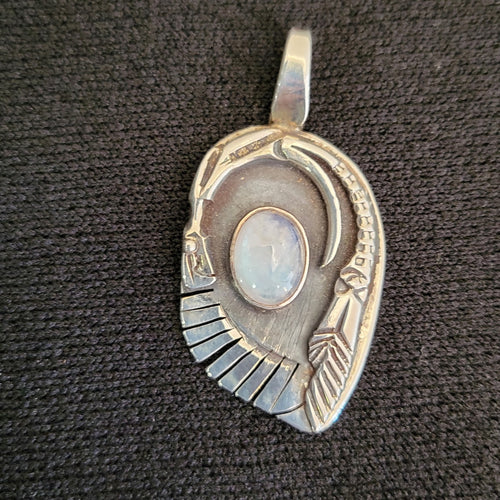 Sterling silver dragon pendant with moonstone by artist Tim Terry