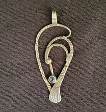 Sterling silver bird pendant with moonstone by Tim Terry