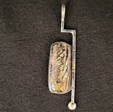 Sterling silver pendant with tourmalinated quartz by artist Tim Terry