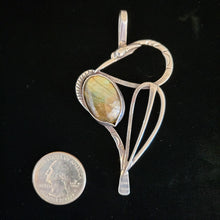 Sterling silver bird pendant with labradorite stone by artist Tim Terry