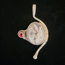 Sterling silver pendant with moss agate and garnet stones by artist Tim Terry