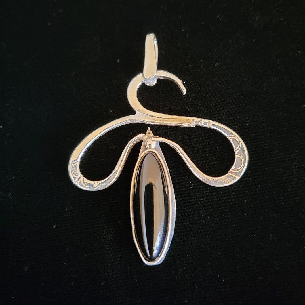 Sterling silver snake pendant with black onyx stone by artist Tim Terry