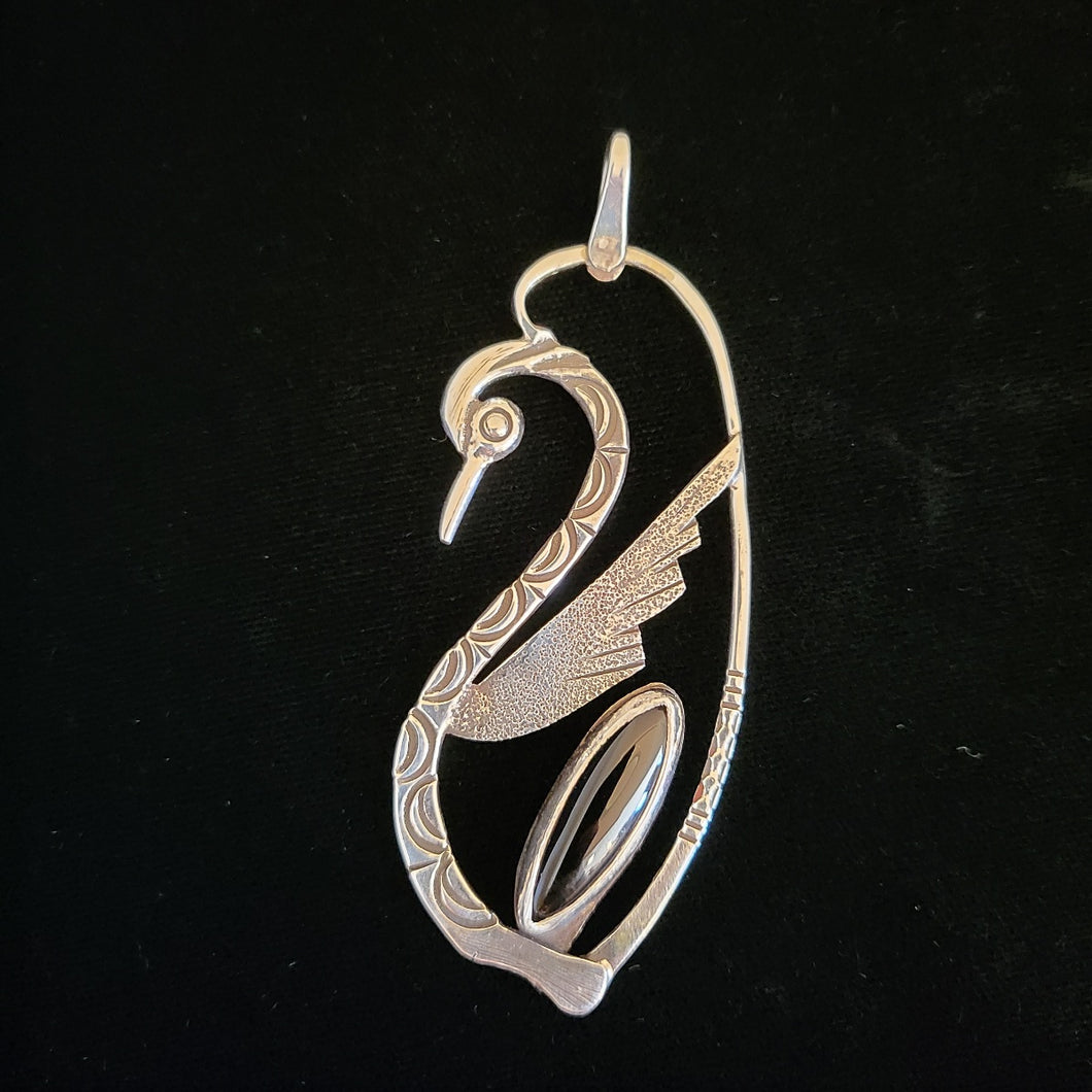 Sterling silver dragon pendant with star garnet stone by Tim Terry