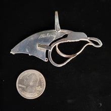 Sterling silver bird/dragon pendant with garnet eye by Tim Terry
