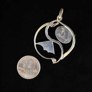 Sterling silver dragon pendant with sodalite stone by Tim Terry