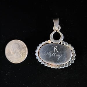 Sterling silver pendant with engraved agate stone by Tim Terry