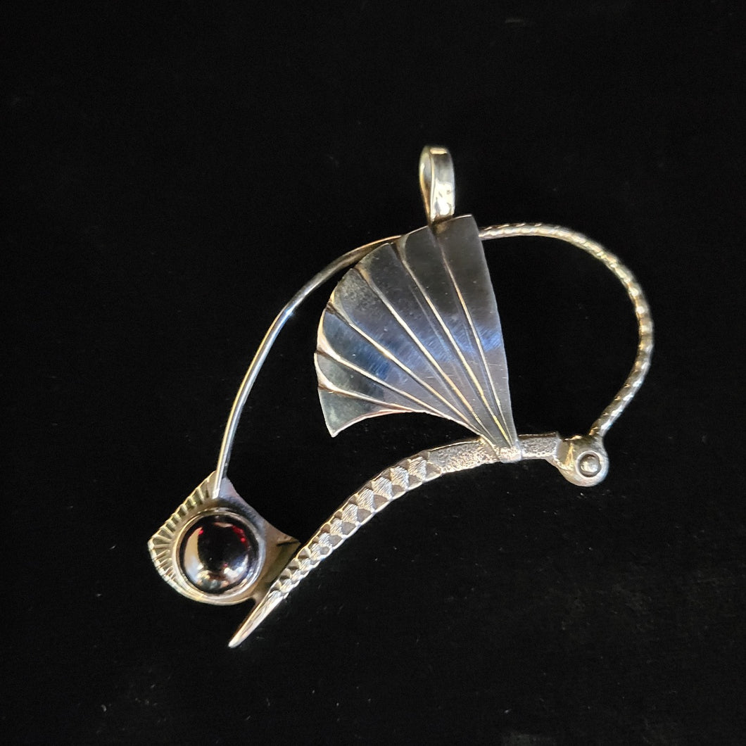 Sterling silver damselfly pendant with garnet stone by Tim Terry