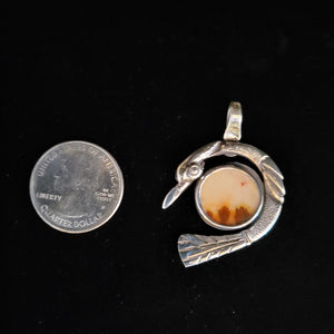 Sterling silver bird pendant with dendritic agate by Tim Terry
