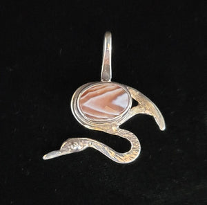 Sterling silver bird pendant with faceted agate stone by Tim Terry