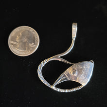 Sterling silver bird's head pendant by Tim Terry