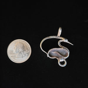 Sterling silver bird pendant with o-ring by Tim Terry