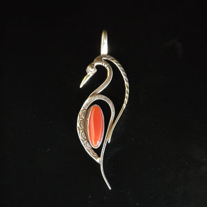 Sterling silver bird pendant with carnelian stone by Tim Terry