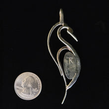 Sterling silver bird pendant with carnelian stone by Tim Terry