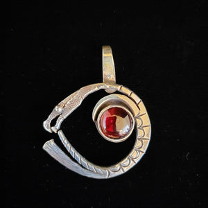 Sterling silver dragon pendant with garnet stone by Tim Terry