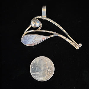 Sterling silver swan pendant with gold eye dendritic agate by artist Tim Terry