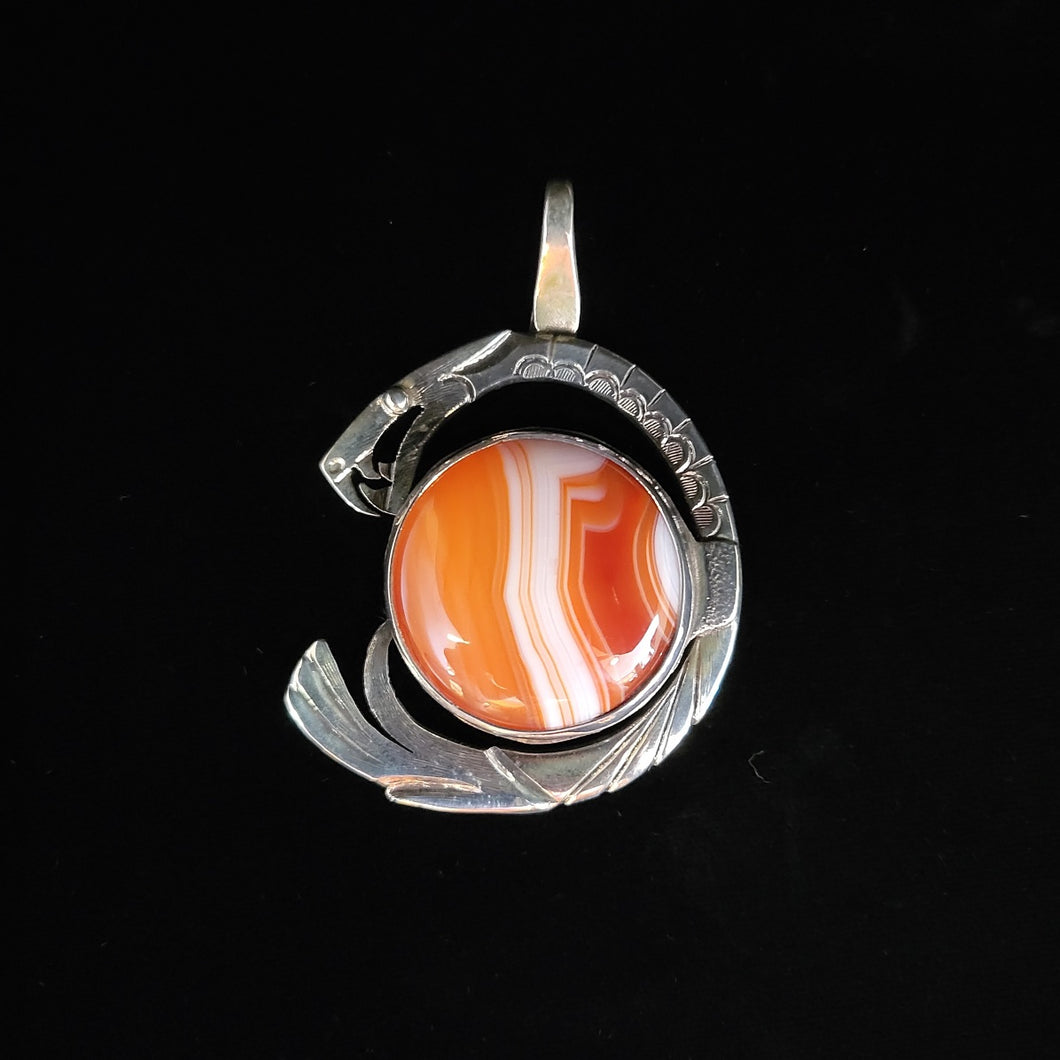 Sterling silver dragon pendant with banded agate by artist Tim Terry