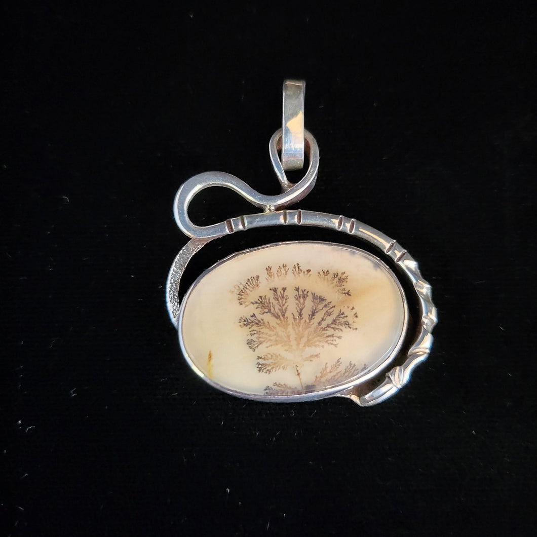 Sterling silver pendant with dendritic agate stone by artist Tim Terry