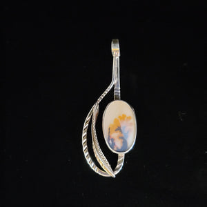 Sterling silver pendant with silver feather and dendritic agate by artist Tim Terry