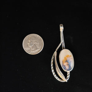 Sterling silver pendant with silver feather and dendritic agate by artist Tim Terry