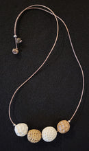 Porcelain beads, leather and sterling silver necklace by Dayana Ferrera