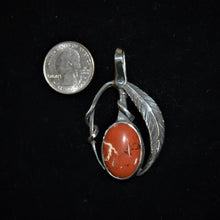 Sterling silver pendant by Tim Terry with coin for size reference