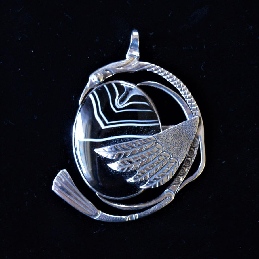 Sterling silver bird pendant by Tim Terry
