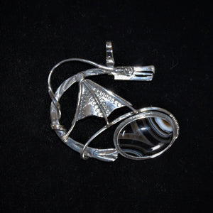 Sterling silver dragon pendant by Tim Terry