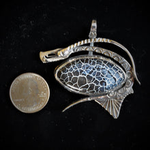 Sterling silver pendant by Tim Terry with coin for size reference