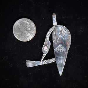 Sterling silver bird pendant with coin for size reference by by Tim Terry